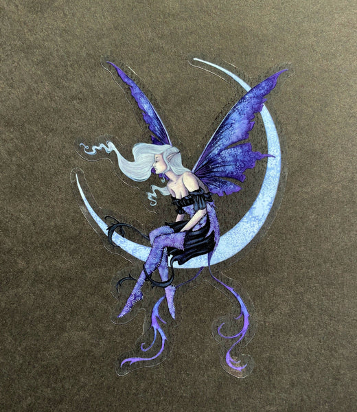 fairy sitting on crescent moon
