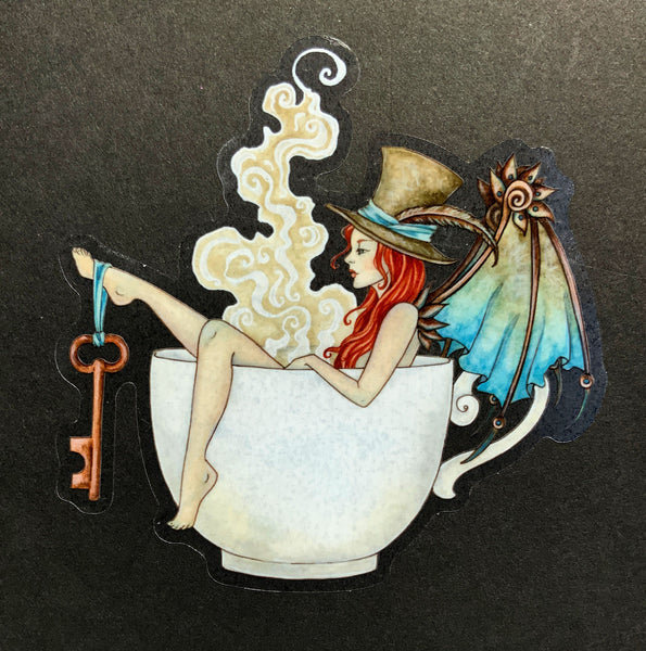 fairy sitting in teacup