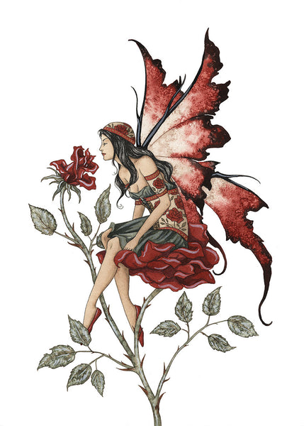 red fairy sitting on a rose