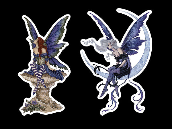 Two fairy stickers with detailed designs on a black background
