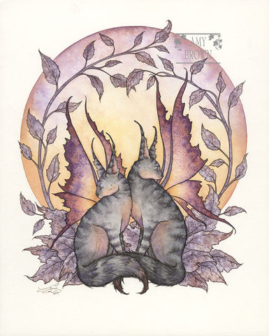 2 fairy cats sitting in vines